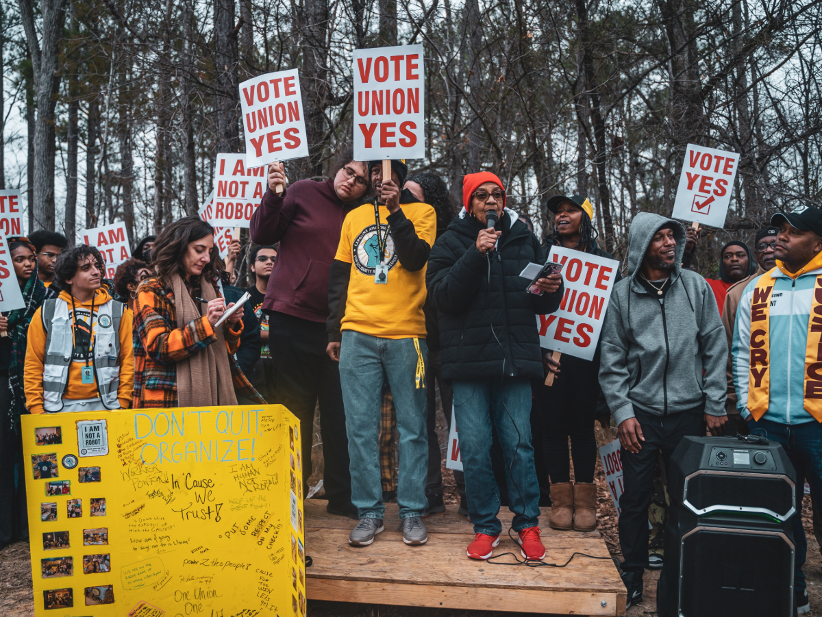 Amazon workers and CAUSE supporters rally outside Amazon warehouse in Garner, NC before union vote.